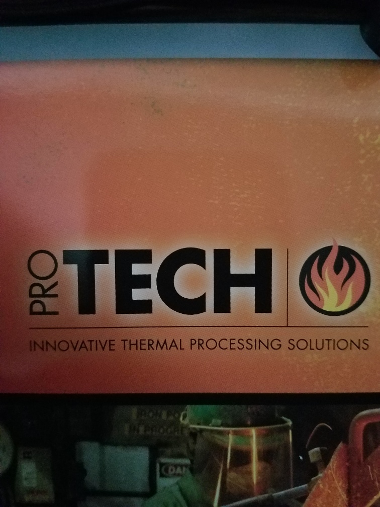 A Pro Tech Logo in Black on a Brown Background